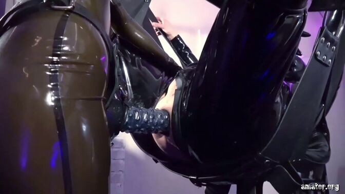 Oiled first time strapon latex